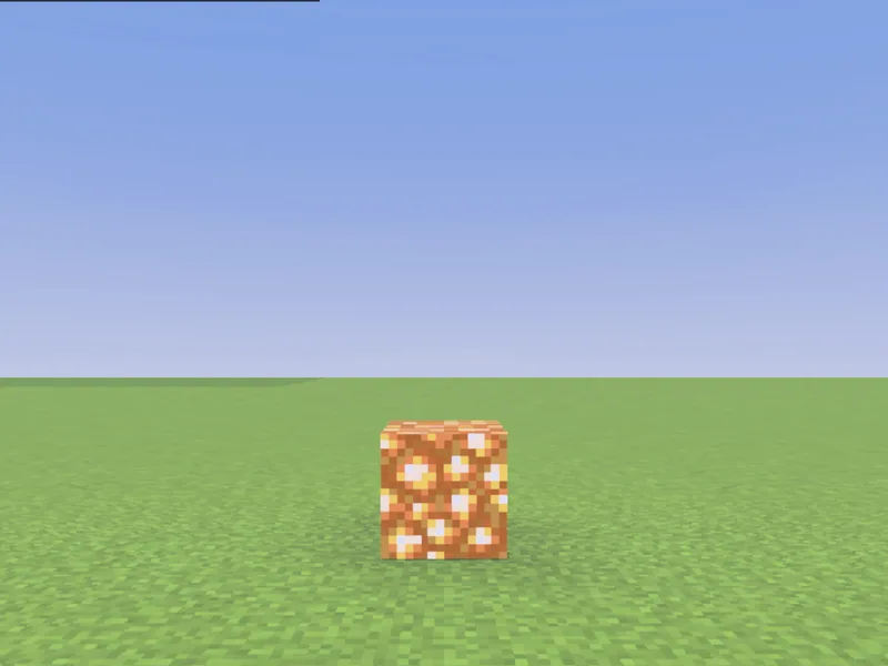 A single glowstone block placed with /setblock in Minecraft (after)